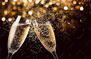 Two champagne glasses clinking together to celebrate the best online casino games for new year’s eve